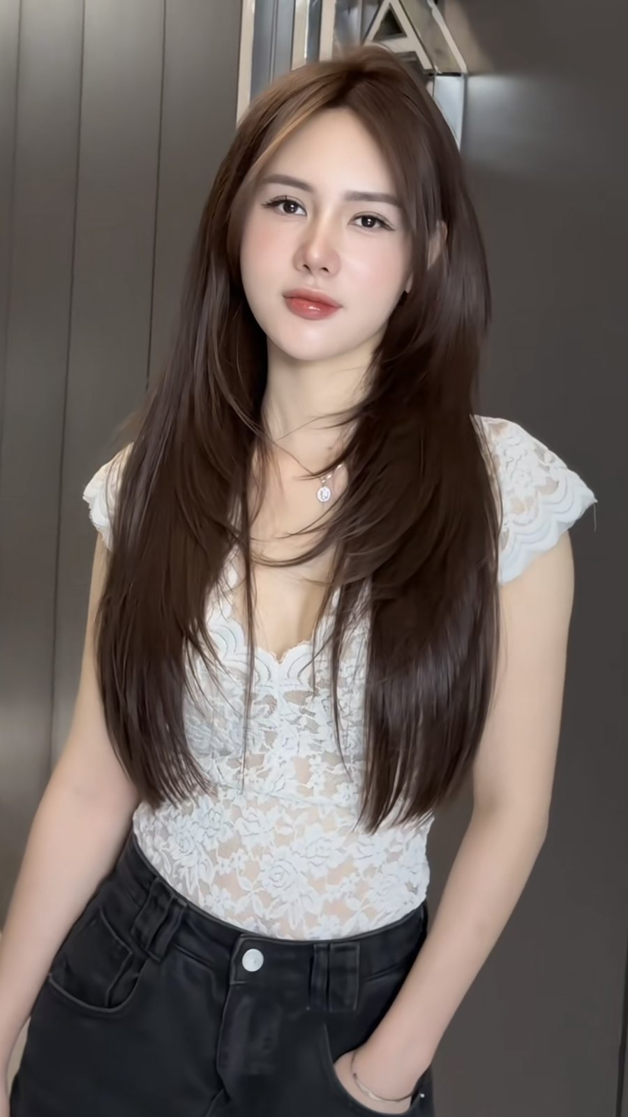 Long light-brown layered haircut at Nhat Tam Hair Salon