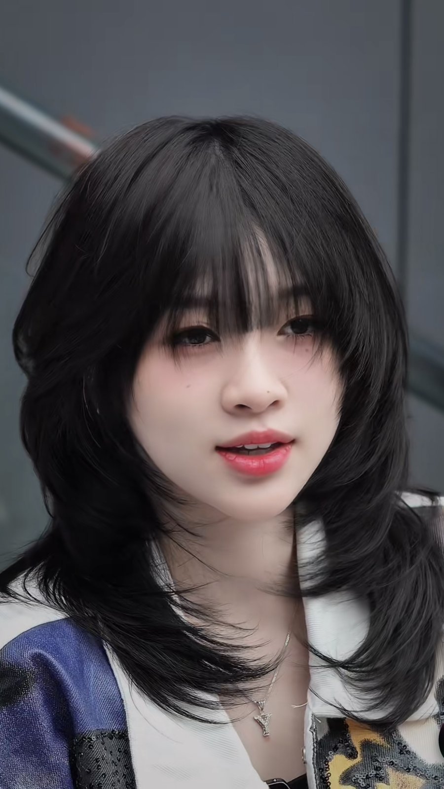 Tóc layer ngang vai tỉa tầng rõ kiểu wolf cut nhẹ, đi cùng mái mưa, khách nữ tại Nhật Tâm Hair Salon