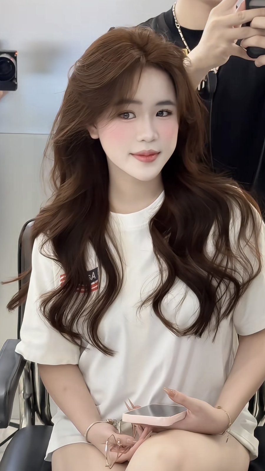 Real warm milk-tea brown waves photographed at Nhat Tam Hair Salon