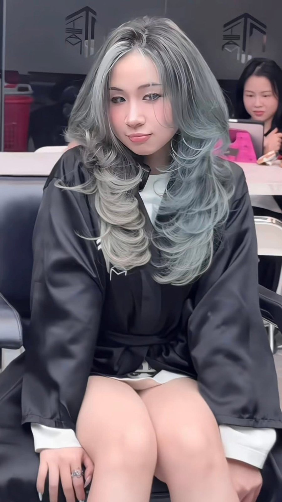 Silver mint ash hair colour on long hair, toned over a bleached base in Hanoi